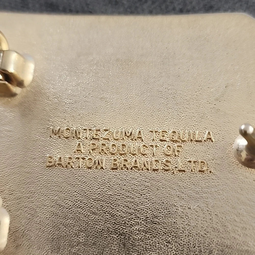 Montezuma Tequila Men’s Belt Buckle By Barton’s  Brands Gold And Black